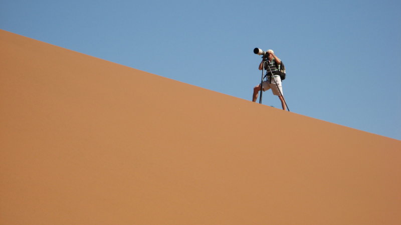 Burdened Photographer