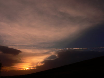 It is April!  A sunset and a storm!