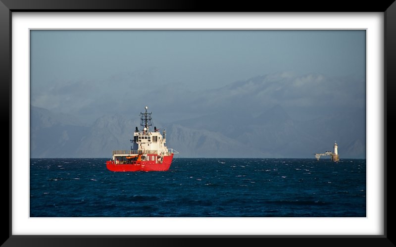 Ship and Lighthouse Near Simons Town