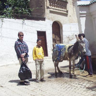 Omar,our Medina guide,Joan and the usual transport