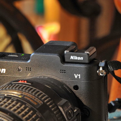 Nikon 1 V1 mit AS N1000 Mikrofonadapter