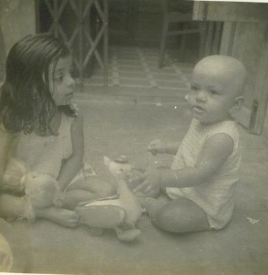 Viju playing with dolls