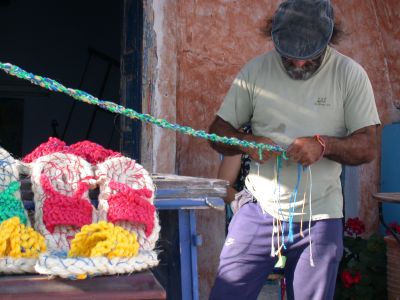 A shoe maker in Oia