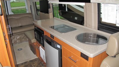 REAR ELECTRIC LEATHER COACH/BED