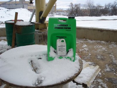 Commissioning of concrete plant, directed an emergency eye be provided, didn't say where it had to be
