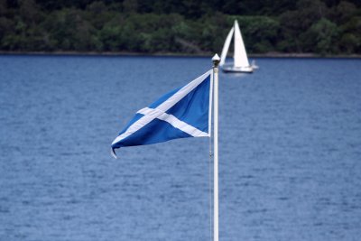 Flag of Scotland over Loch Ness