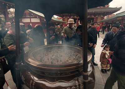 Burning Incense at Akakusa Temple