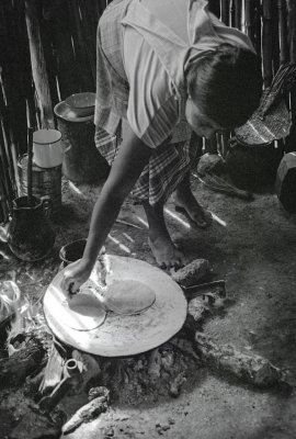 Kekchi Woman Cooking Tortillas