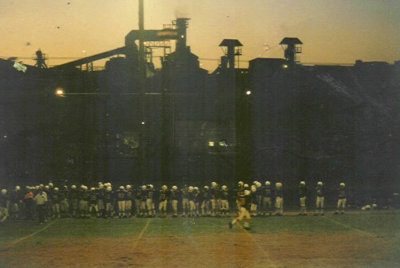 A game at old Panther Stadium with Lufkin Industries in the background. The field is gone now.