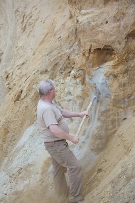 Mr. Dick Mol showing different sand-layers