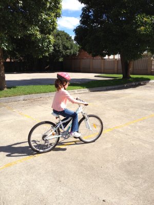 Astrid learning to ride