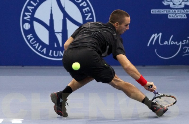 Viktor Troicki (Serbia) in action at the ATP Malaysia Open 2011.