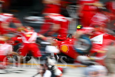 Ferrari's crew practices pit-stop