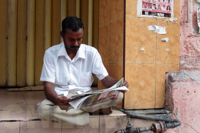 Reading newspapers 20110522-082525-023.jpg