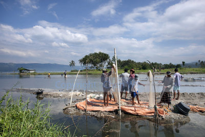 Villagers fishing at Lake Singkarak