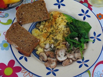 Omelet with vegetables, cooked at home.