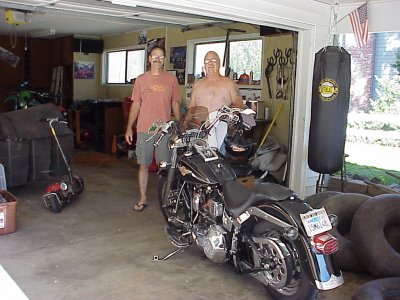 Two manly dudes in the garage.