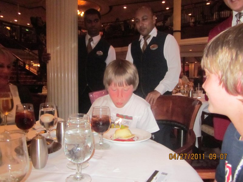 Ian celebrating his 10th birthday with a treat from the staff