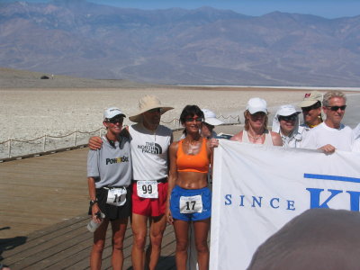 Pam Reed, Dean Karnazes and Noora Alidina are the first three from left to right.  Wow Dean has his arm around Pam.
