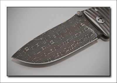 Lion Steel SR-1 - Titanium folder with Chad Nichols Iguana Damascus blade