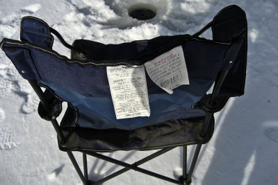 ice fishing-essential equipment 1, a chair and a hole!