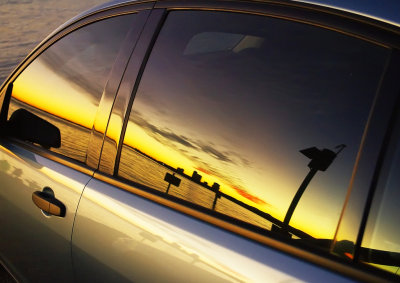 Sunset in Car Windowby Bruce McIntosh