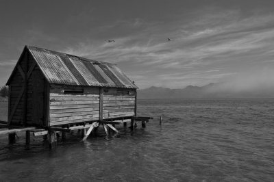 Seaside Boathouse in Morning Mistby Nina Henderson