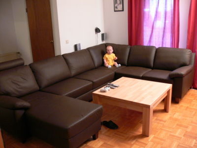 Brayden with new couch and table
