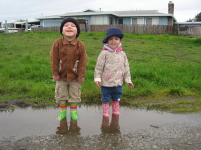 Very happy Dylan & Corrina playing in the puddles