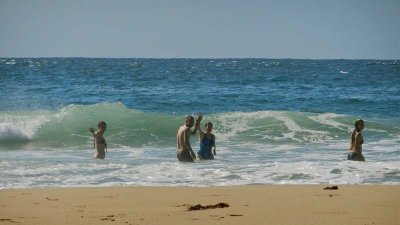 Mark joins the gang in the surf