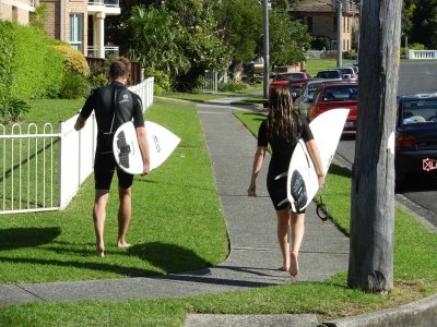 Adam and Jess walk home from their beach
