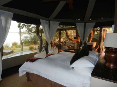 Elegant bed in our tent at Chongwe