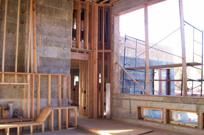 Edge of the fireplace, and bedroom door