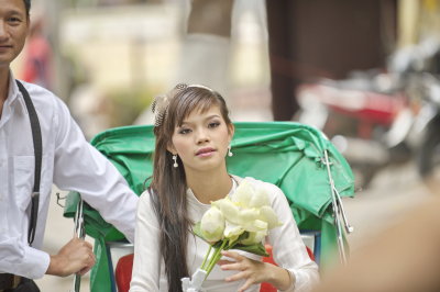 A young bride and an happy groom.