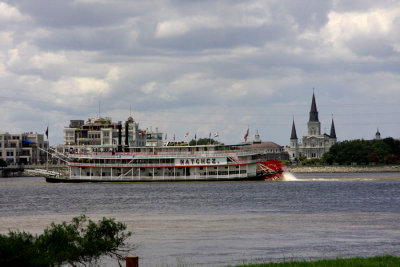 St. Louis Cathedral with Steamboat Natchez in Mississippi River