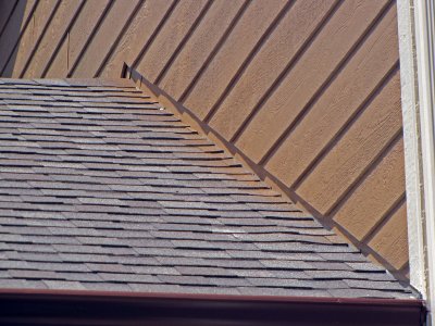 Paint Over-spray on Shingles....Doug Whetsell's Solution offered: Oh, we can wire-brush the shingles
