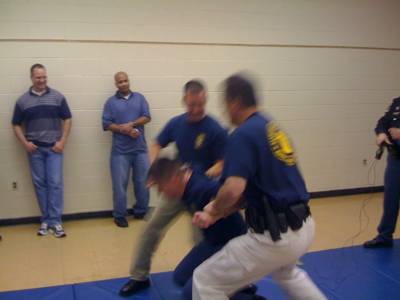 Taser Qualification - me in white pants