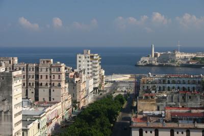 view onto Prado promenade with Morro Castle in the distance
