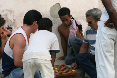locals playing boardgames on streets