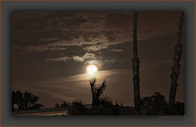 2011 Perigee Moon's Brief Appearance Through Clouds