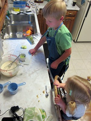 Kids working on dinner