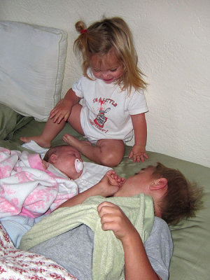 Kids helping Annie sleep