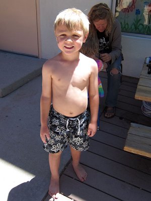 Simon after playing in water on last day of school