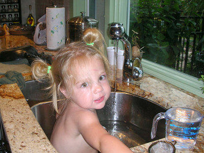 Kristina offers to wash dishes