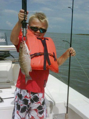 Simon lands a nice snapper