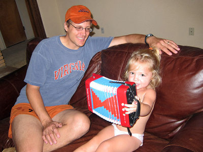 Kristina tries playing accordion