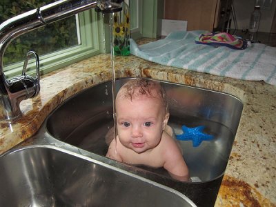 A Lane sibling tradition: bath-time in Baba's sink