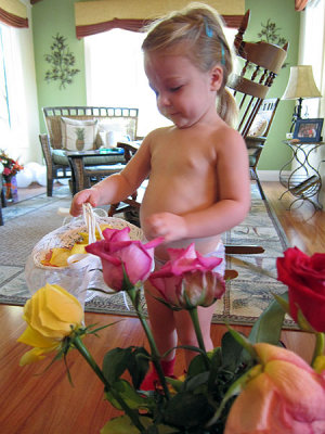 Kristina picks rose petals for her basket