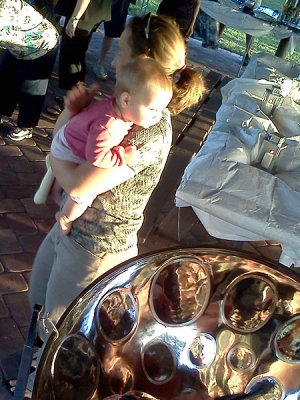 Enjoying steel drums at rehearsal dinner