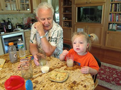 Kristina and Uncle Joe enjoy fresh grapefruit juice